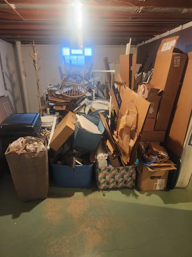 Roll-off dumpster container at job site for Yard Waste Dumpster Rental in Gautier